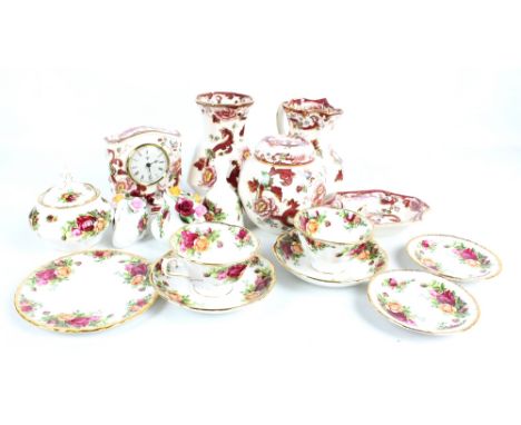 A collection of Masons 'Mandalay red' pattern ceramics to include ginger jar, jug and mantle clock and a quantity of Royal Al