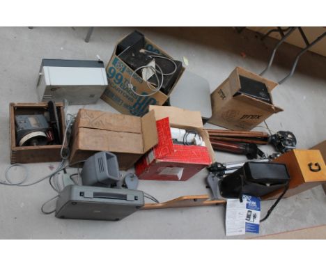 A large quantity of photographic equipment to include a Paillard Bowlex camera, tripod, etc. 