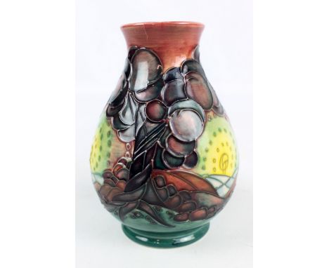 MOORCROFT; a 'Mamoura' pattern tubeline decorated baluster vase, impressed marks and signature to base, dated 1992 with a can