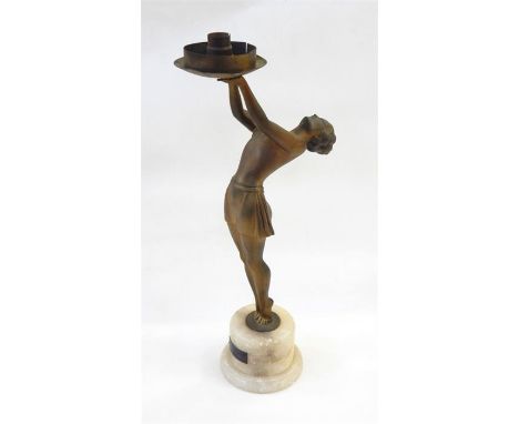 Art Deco bronzed-effect metal female figure table lamp in the form of female figure semi reclining and holding the circular l