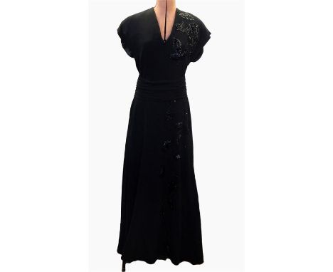 1940's black crepe evening dress with slight train, embroidered on the left shoulder in sequins, bugle beads and faux-jet and