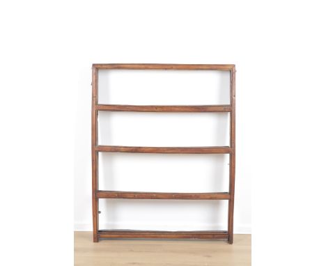 AN ELM PLATE RACK19th century, fitted with four open shelves, the lower tier with cup hooks, 114cm high x 88cm wide x 11cm de