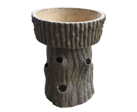 A TERRACOTTA FAUX BOIS PLANTERlate 19th/20th century, modelled in the form of a tree trunk with numerous branch apertures, 77