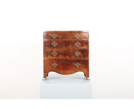 A GEORGE III STYLE MAHOGANY MINIATURE BOWFRONT CHEST OR APPRENTICE PIECEthe two small drawers above three long drawers outlin