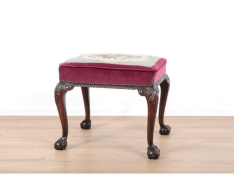 A GEORGE III STYLE MAHOGANY STOOLmid-20th century, upholstered in tapestry and velvet, on acanthus-capped cabriole legs, and 