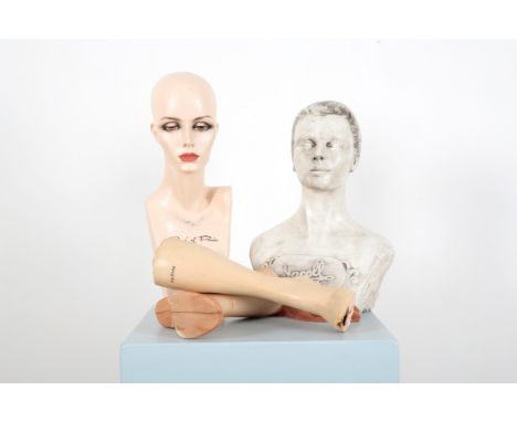 A MANNEQUIN BUST BY 'JACOLL HOLTS' of monochrome plaster construction with closely cropped hair, 48cm high approx.; together 