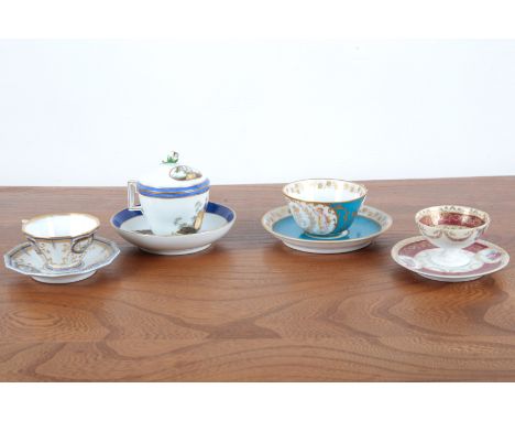 A SÈVRES CHATEAU DES TUILERIES CUP AND SAUCER 19th century, the 'LP' monogrammed cartouche enclosed by cherubs and gilt folia