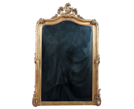 A VICTORIAN ROCOCO STYLE OVERMANTEL MIRRORwith central scroll cartouche with floral swags, the corners decorated with acanthu