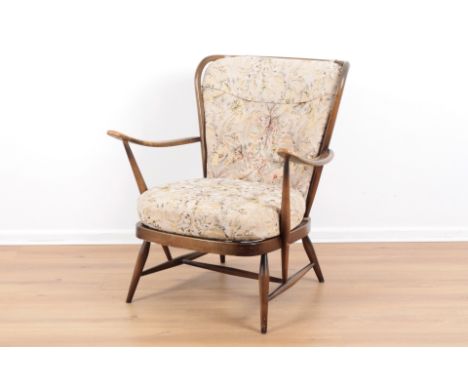 ERCOL, MODEL NO. 477: A STAINED BEECH EASY CHAIRmid-century, with spindle back and upswept arms, webbing beneath cushion seat