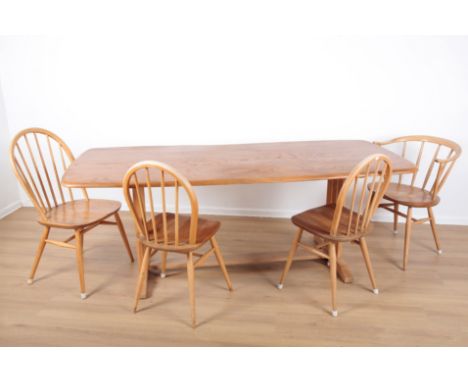 RARE ERCOL, MODEL NO. 594: AN ELM AND BEECH REFECTORY TABLEmid-century modern, the rectangular top with rounded corners (spli