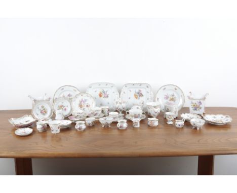 A LARGE COLLECTION OF DRESDEN CABINETWARE 19th century and later, including various gilt and florally decorated teacups, sauc