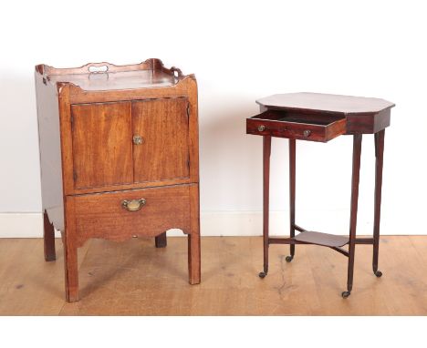 A GEORGE III MAHOGANY BEDSIDE CUPBOARD OR COMMODEthe gallery with twin handle cut-outs, enclosed by a pair of doors, on squar