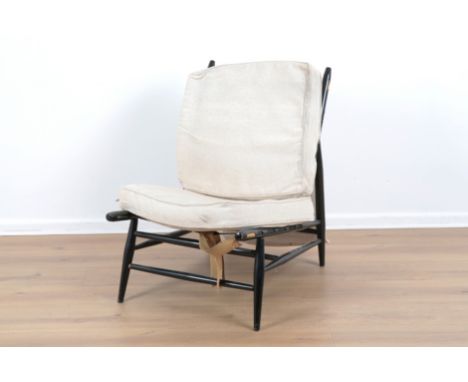 ERCOL, MODEL NO. 427: A BEECH AND ELM CHAIRmid-century modern, requiring restoration to the webbing, terminating on spindle l