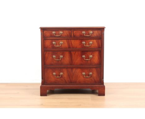 A GEORGE III STYLE MAHOGANY CHEST OF DRAWERSwith two small upper drawers above three long drawers with swan neck handles, ter
