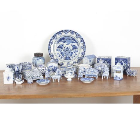 A LARGE COLLECTION OF BLUE AND WHITE DELFTWARE 19th/20th century, including flower bricks, vases, jars, shoes, a platter, and