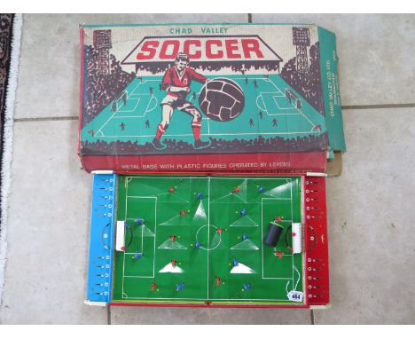 A Chad Valley tabletop soccer game, with original box and ball bearings, see images for details, play worn but in working con