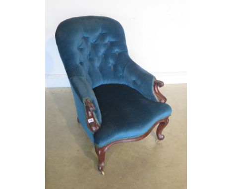 A Victorian mahogany button back fireside upholstered  chair - 82cm H, 60cm W 