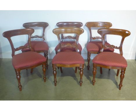 A set of 19th Century style mahogany dining chairs, old repair to one, all solid and clean condition with light wear 