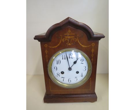 An Edwardian inlaid mahogany mantle clock striking on a gong, 34cm tall, clean condition, running order 