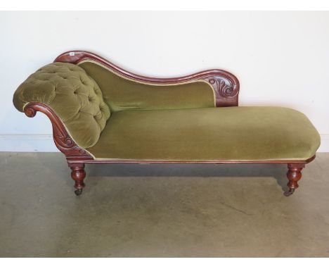 A Victorian mahogany scroll back chaise longue in green button material, 183cm long, 83cm High, 62cm deep, overall good condi
