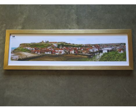 A Tony Brodrick print of Whitby in a gilt frame, frame size 30cm x 92cm 