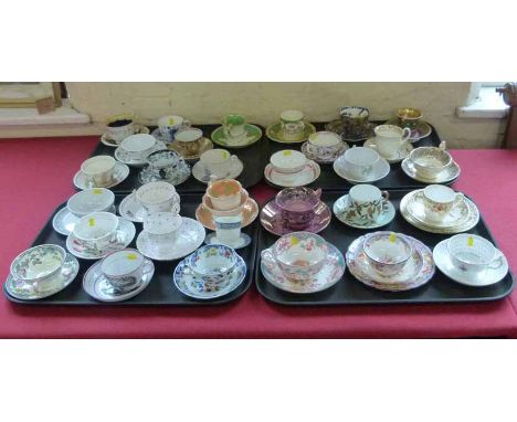 Thirty one 19th century and later cups and saucers/trios. No condition reports for this sale