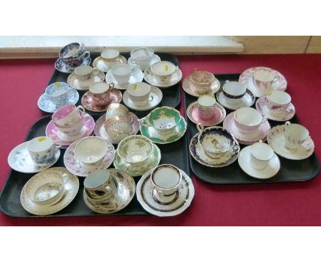 Twenty seven English porcelain cups and saucers / trios early 19th century and later. No condition reports for this sale