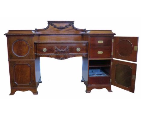 Edwardian mahogany twin pedestal sideboard, drop centre with single drawer, flanked by two pedestals each with two doors cove