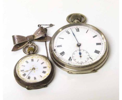 A ladies silver fob watch with silver bar brooch together with a white metal pocket watch. No condition reports for this sale