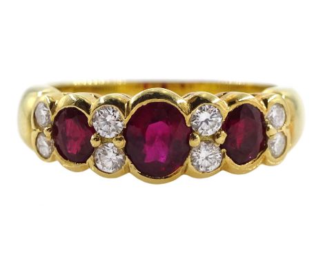 18ct gold three stone oval ruby and eight stone round brilliant cut diamond ring, London 2008