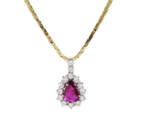 18ct white and yellow gold pear shaped ruby and round brilliant cut diamond cluster pendant necklace, stamped 750, ruby appro