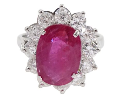 18ct white gold oval ruby and round brilliant cut diamond cluster ring, stamped 18K, ruby approx 3.70 carat, total diamond we