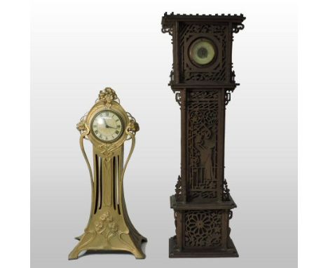 A 19th century continental walnut fret carved barometer, in the form of a miniature longcase clock, 56cm tall, together with 