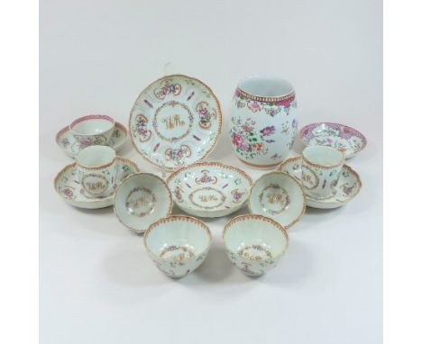 An 18th century Chinese export porcelain famille rose matched part tea set, decorated with flowers within a spearhead border,