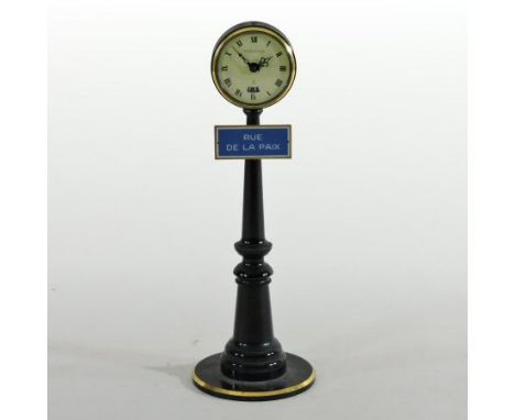 A 1970's Jaeger Le Coultre black marble novelty alarm clock, the circular dial showing Roman numerals, in the form of a Paris