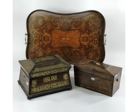A Regency rosewood and cut brass inlaid tea caddy, together with another Regency rosewood tea caddy and an Edwardian mahogany