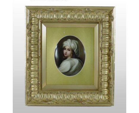 A 19th century KPM Berlin porcelain oval plaque, finely painted with a portrait of Beatrice Cenci, after the original by Guid