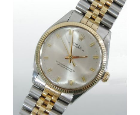 A Rolex gentleman's oyster perpetual bi-metal chronometer wristwatch, having a silvered dial with gilt baton hours, on a flex