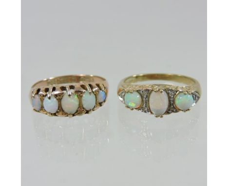 A 9 carat gold five stone opal ring, set with a single row of graduated stones, together with another similar, boxed (2)