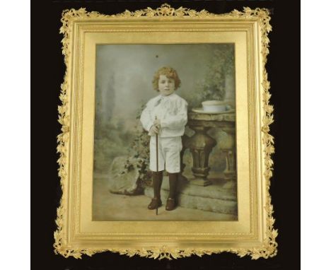 Continental school, (19th century), photographic portrait of a young boy, 36 x 29cm, mounted in an ornate gilt frame and glaz