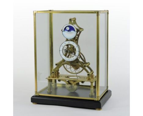 A brass skeleton clock, having enamel hours, with a moonphase, on an ebonised plinth, contained in a glazed case, 40cm high 