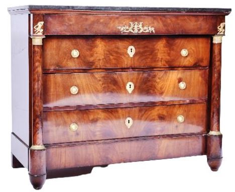 An early 19th Century French Louis Philippe period walnut marble topped commode. The chest of drawers having a removable blac