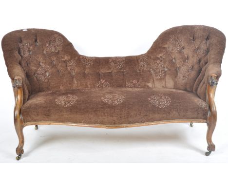 A Victorian 19th century Chesterfield double bed chaise longue sofa settee being raised on cabriole legs with castors having 