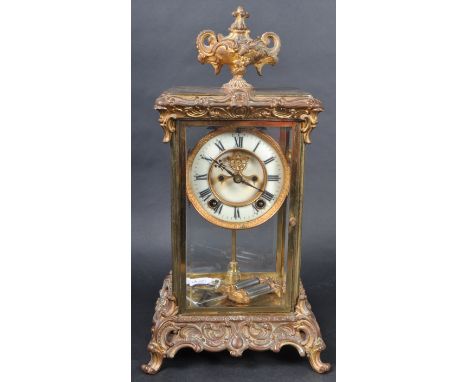 A 19th Century American Ansonia of New York Clock Company four glass mantel clock. The clock of upright form with ormolu cast