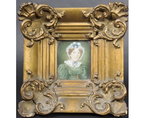 A mid - late 19th Century Victorian watercolour on ivory portrait miniature painting study depicting a woman in green dress w