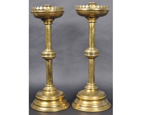 A large pair of 19th Century&nbsp;Gothic Ecclesiastical polished brass candlesticks in the manner of AWN Pugin for John Hardm