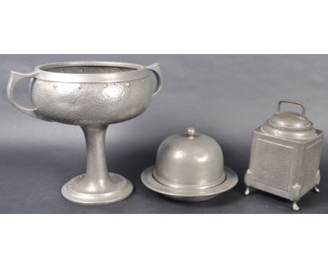 Frank Cobb - Period Pewter - Liberty & Co - A collection of three 20th Century Arts & Crafts / Art Deco pewter comprising a t