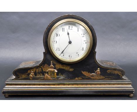 An early 20th Century Swiss made Chinoiserie decorated mantel clock. Central circular enamel dial with black faceted hands de