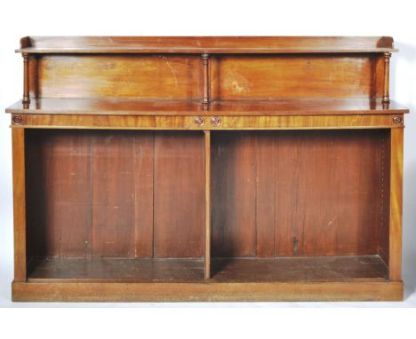 A large 19th Century Victorian mahogany open library bookcase having a raised gallery top with single shelf supported by turn