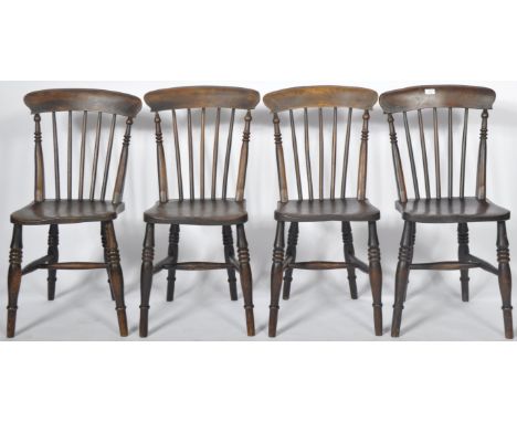 A set of four 19th Century beech &amp; elm kitchen farmhouse Windsor manner dining chairs. The chairs with curved bar backs, 